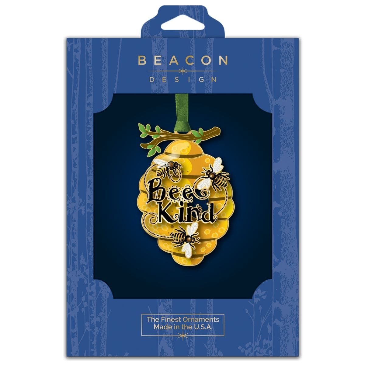 Bee Kind ornament from Beacon Design in retail packaging, featuring a golden beehive with three honeybees and the inspirational message “Bee Kind.”