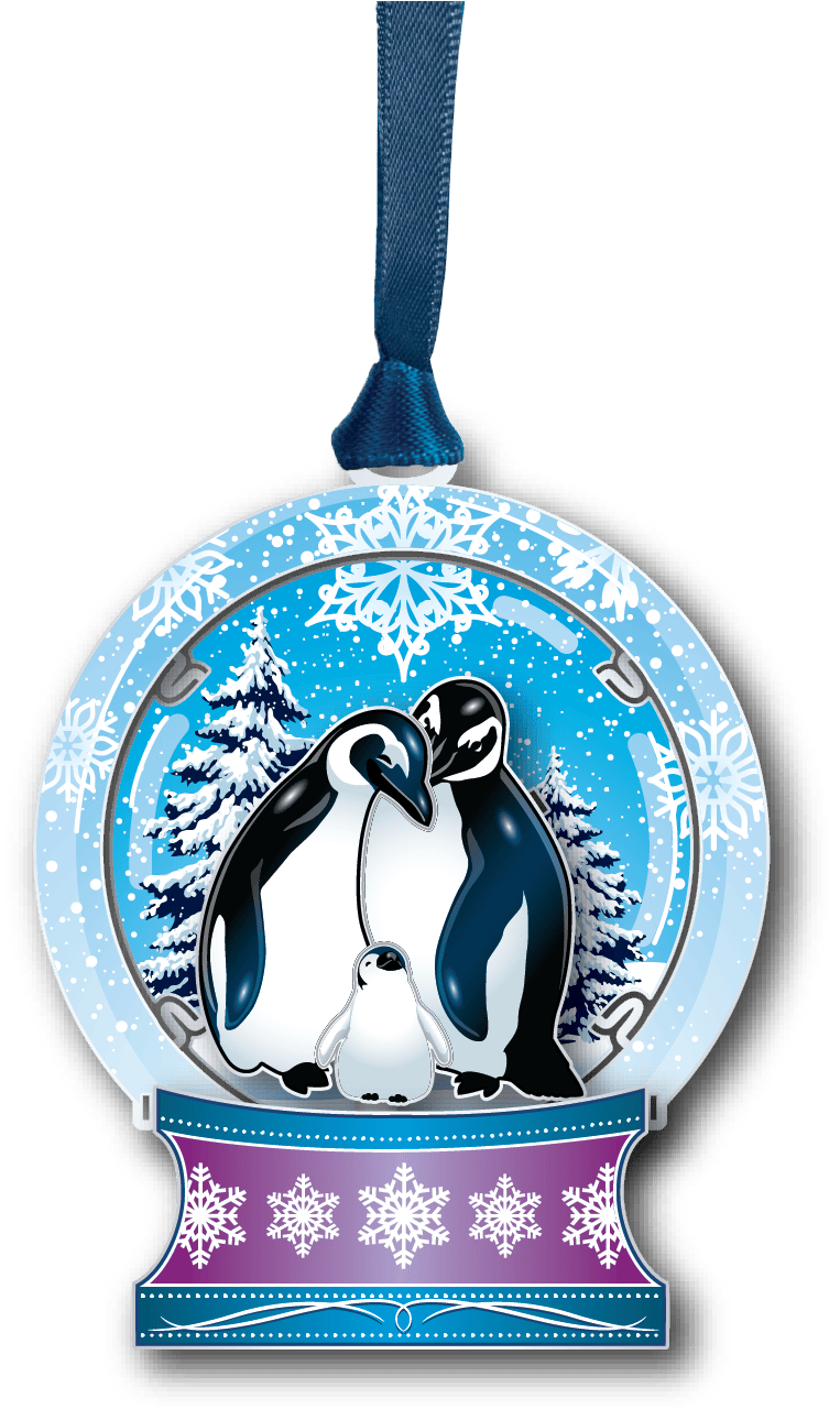 Snow globe ornament featuring two adult penguins and a baby penguin surrounded by snowy trees and winter accents.