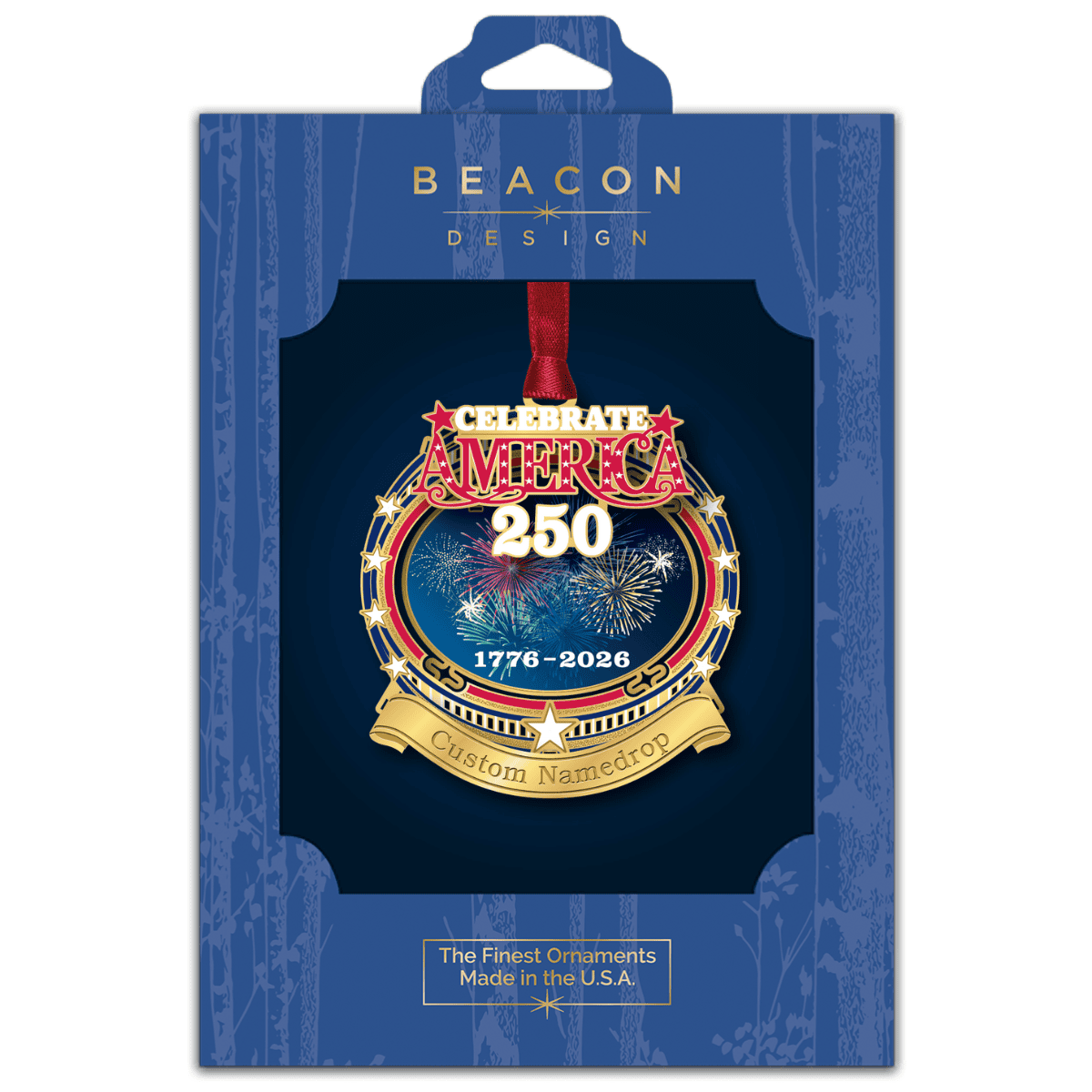 Custom namedrop ornament featuring “Celebrate America 250” with patriotic fireworks, gold stars, and the years 1776–2026, displayed in Beacon Design retail packaging