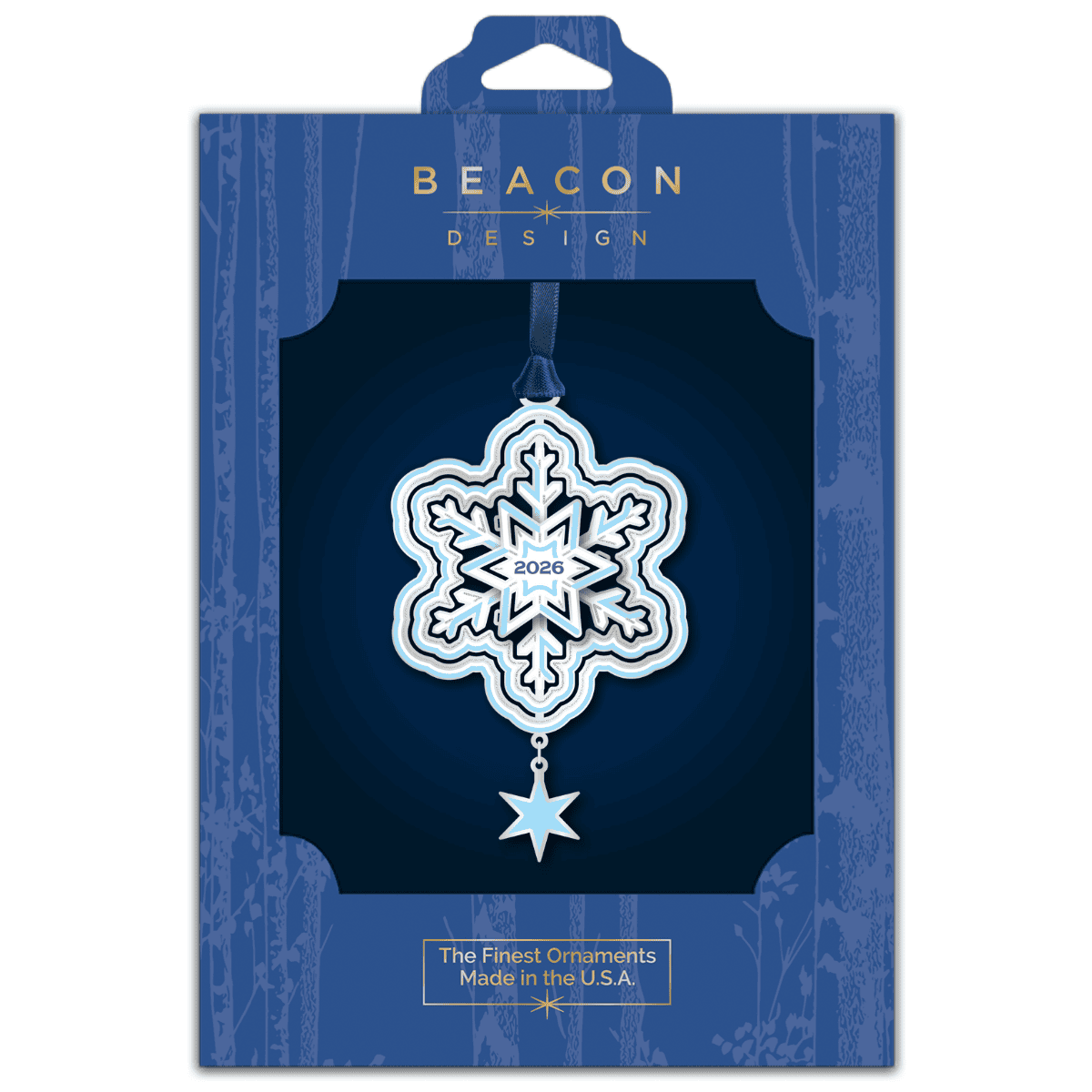 Ornament featuring a layered snowflake design with the year “2026” at the center and a dangling star accent, displayed in Beacon Design retail packaging