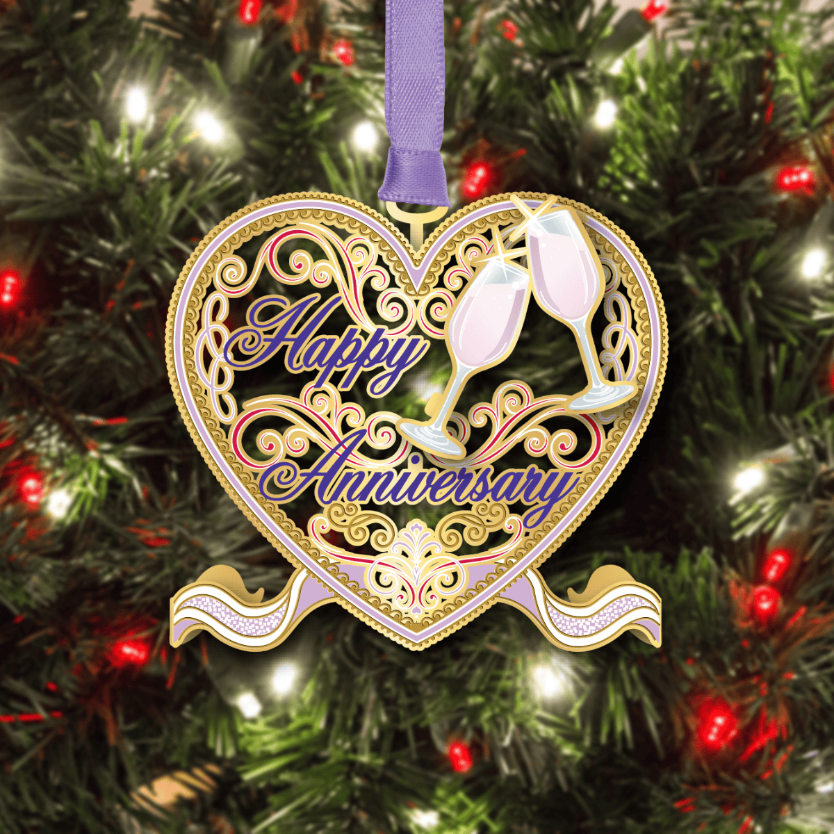 Custom standing ornament featuring a heart-shaped design with ornate scrollwork, champagne flutes, and the message “Happy Anniversary,” displayed on a decorated Christmas tree