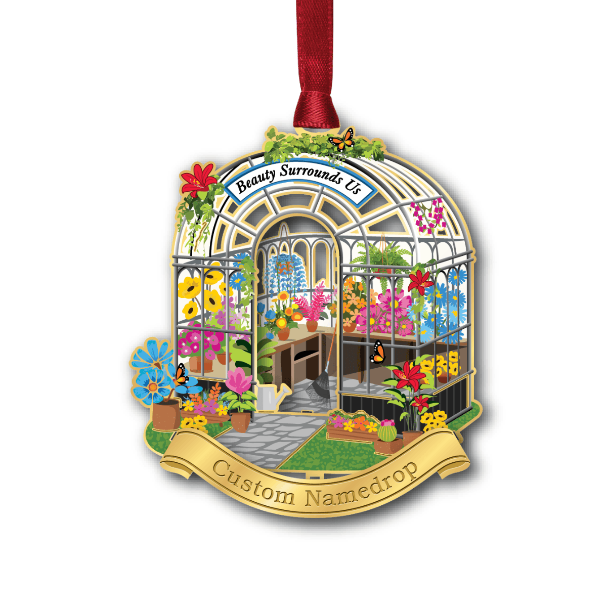 Custom namedrop ornament featuring a detailed greenhouse filled with colorful flowers, plants, and butterflies, with the phrase “Beauty Surrounds Us”