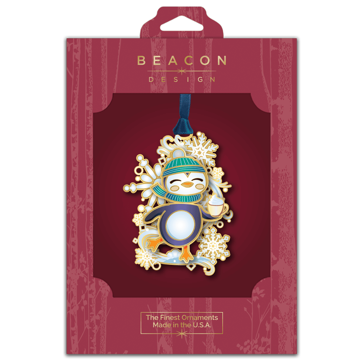 Ornament featuring a penguin in winter attire displayed in Beacon Design retail packaging
