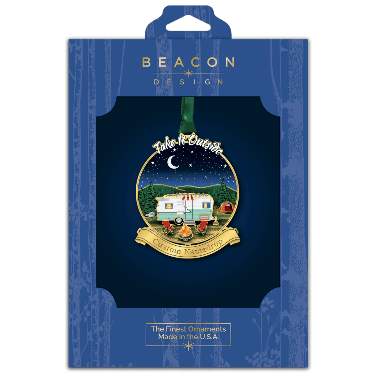 Custom namedrop ornament featuring a vintage camper, campfire, and tent under a starry night sky displayed in Beacon Design retail packaging